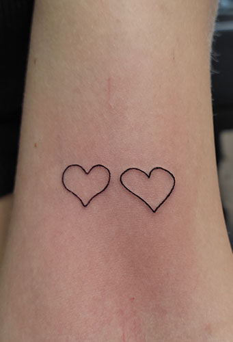 Fineline Hearts Tattoo